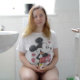A cute, plump girl takes a piss and a shit while sitting on a toilet and smiling to herself. Some farts are heard after the plops. What is so remarkable about the clip is how normal and "girl next door" she seems to be. 720P HD. About 2.5 minutes.